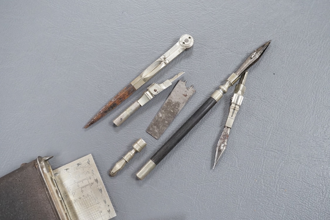 An early to mid 19th century pocket draughtsman's set containing steel drawing implements, (several items missing/broken).